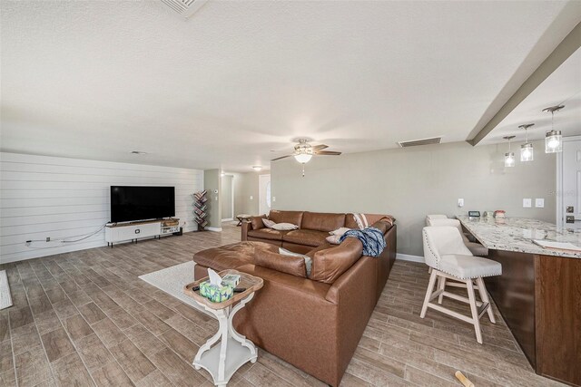 15525 Old Dixie Hwy, Hudson, FL 34667 - living area with light wood-type flooring and a ceiling fan