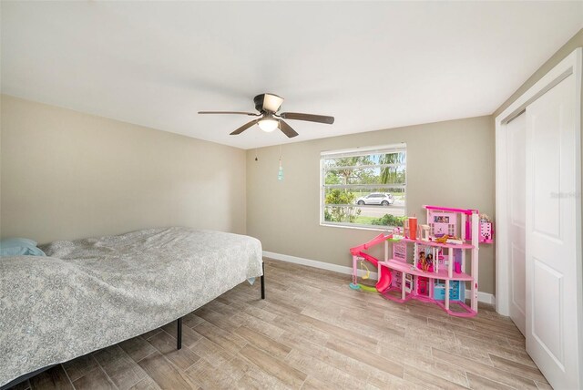 15525 Old Dixie Hwy, Hudson, FL 34667 - bedroom with wood finished floors and a ceiling fan