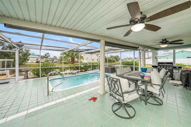 15525 Old Dixie Hwy, Hudson, FL 34667 - outdoor pool with a patio, a ceiling fan, a grill, and a lanai
