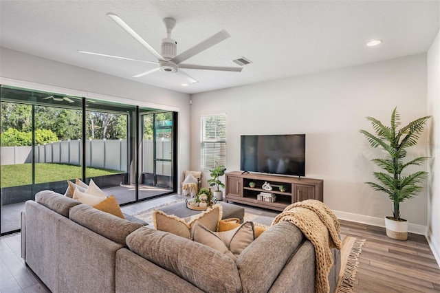 14626 Horse Trot Rd, Lithia, FL 33547 - living area featuring ceiling fan, wood finished floors, and recessed lighting