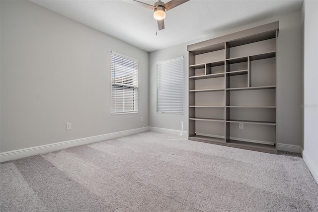 14626 Horse Trot Rd, Lithia, FL 33547 - carpeted empty room with baseboards and ceiling fan
