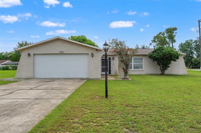 9171 Horizon Dr, Spring Hill, FL 34608 - ranch-style house featuring stucco siding, an attached garage, driveway, and a front lawn