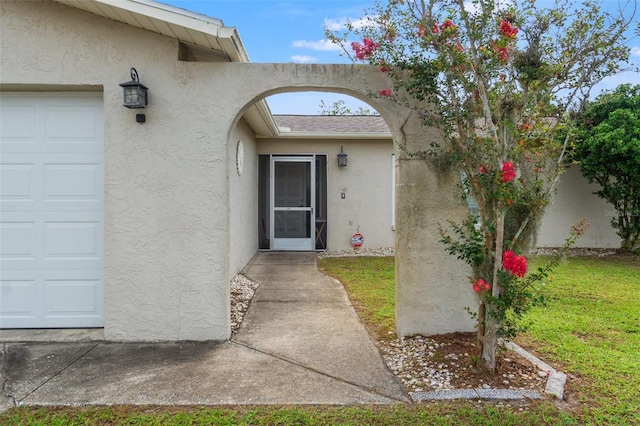 9171 Horizon Dr, Spring Hill, FL 34608 - entrance to property with stucco siding and a garage