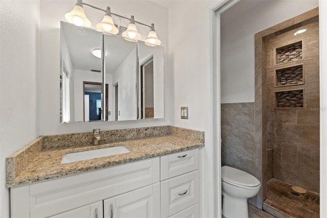 9171 Horizon Dr, Spring Hill, FL 34608 - bathroom featuring vanity and tiled shower
