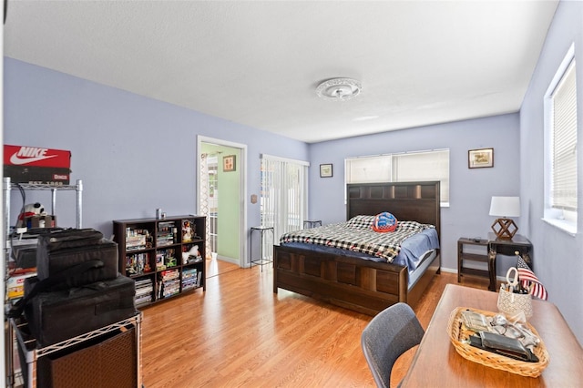 9171 Horizon Dr, Spring Hill, FL 34608 - bedroom with light wood-type flooring