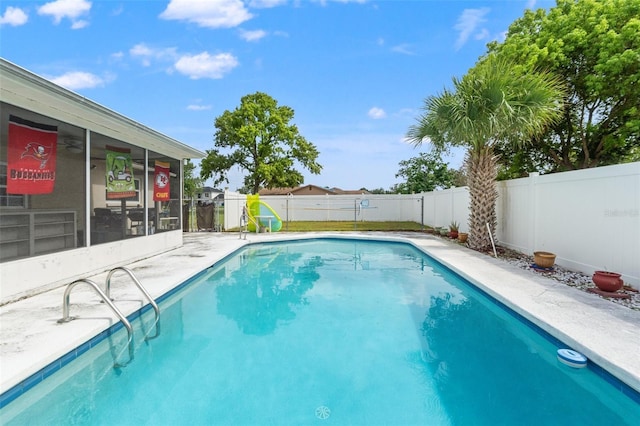 9171 Horizon Dr, Spring Hill, FL 34608 - view of pool featuring a sunroom, a fenced backyard, and a patio area
