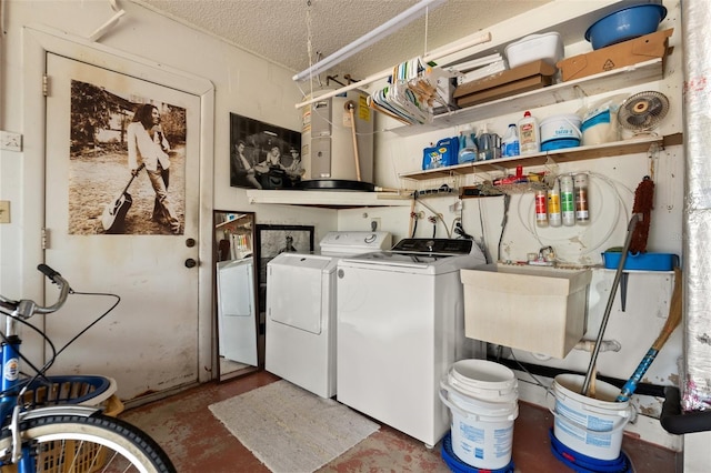 9171 Horizon Dr, Spring Hill, FL 34608 - laundry area featuring washer and clothes dryer and a textured ceiling