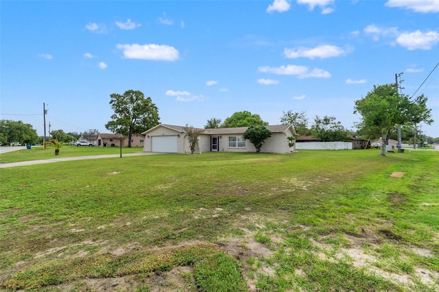 9171 Horizon Dr, Spring Hill, FL 34608 - view of front facade with an attached garage, stucco siding, a front yard, and driveway
