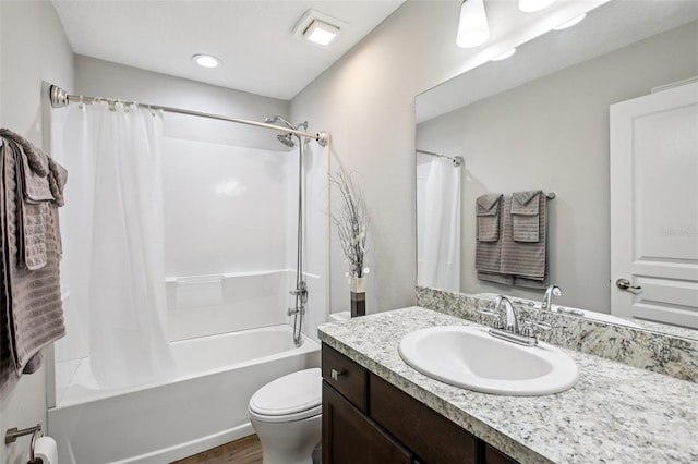 14509 Mayer Ave, Hudson, FL 34669 - bathroom featuring vanity, shower / bath combo, wood finished floors, and recessed lighting