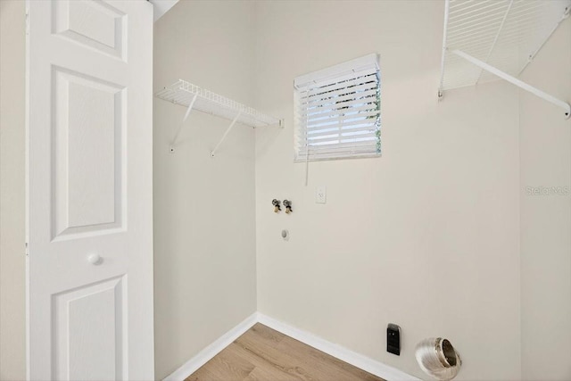 1760 Mountclair Ct, Mount Dora, FL 32757 - washroom featuring light wood-style floors and washer hookup