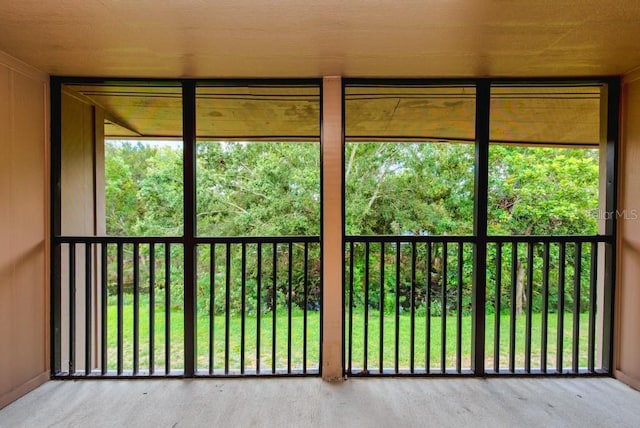 200 Country Club Dr Unit 1402, Largo, FL 33771 - unfurnished sunroom with healthy amount of natural light