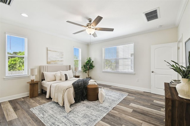 2405 W N B St Unit 1, Tampa, FL 33609 - bedroom with crown molding, wood finished floors, a ceiling fan, and recessed lighting