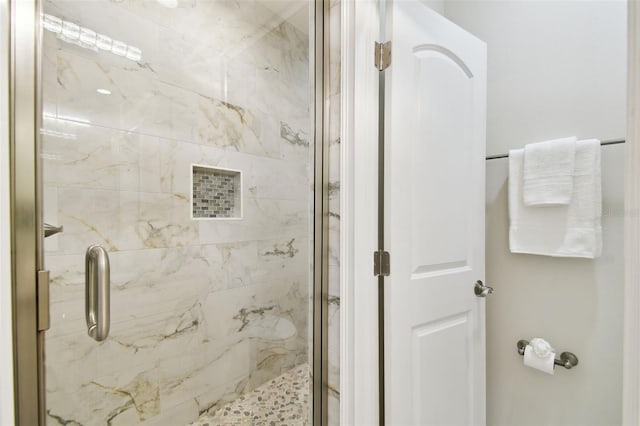 2405 W N B St Unit 1, Tampa, FL 33609 - bathroom featuring a marble finish shower