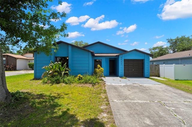 1421 Vinetree Dr, Brandon, FL 33510 - view of front of property featuring an attached garage and driveway
