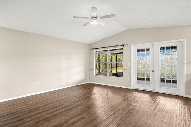 1421 Vinetree Dr, Brandon, FL 33510 - spare room with lofted ceiling, ceiling fan, and dark wood-style flooring