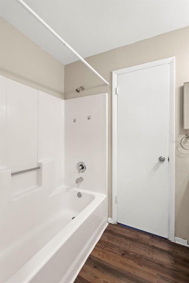 1421 Vinetree Dr, Brandon, FL 33510 - full bathroom with bathtub / shower combination and wood finished floors