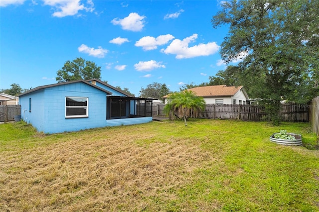 1421 Vinetree Dr, Brandon, FL 33510 - fenced backyard with a sunroom