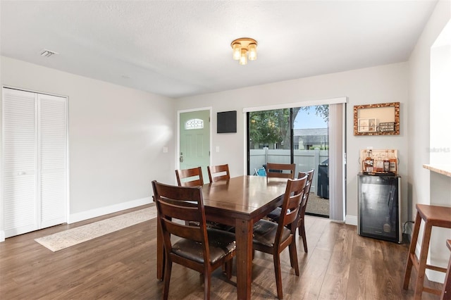 200 Gretchen Ct, Oldsmar, FL 34677 - dining area featuring wood finished floors and baseboards