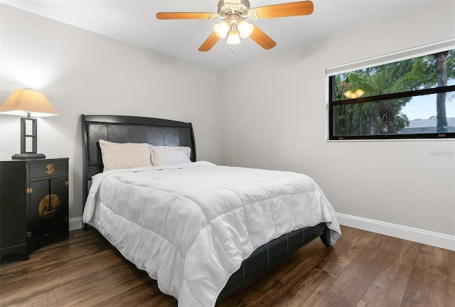 200 Gretchen Ct, Oldsmar, FL 34677 - bedroom with dark wood finished floors and ceiling fan