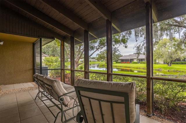 200 Gretchen Ct, Oldsmar, FL 34677 - sunroom featuring a water view and plenty of natural light