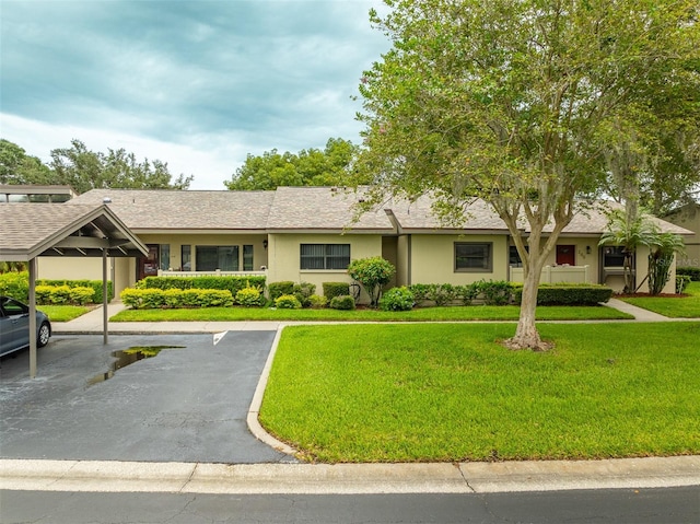 200 Gretchen Ct, Oldsmar, FL 34677 - view of property featuring covered and uncovered parking