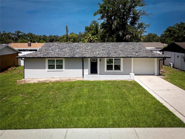 5018 Pine St, Seffner, FL 33584 - ranch-style house with concrete driveway, a front yard, an attached garage, and stucco siding