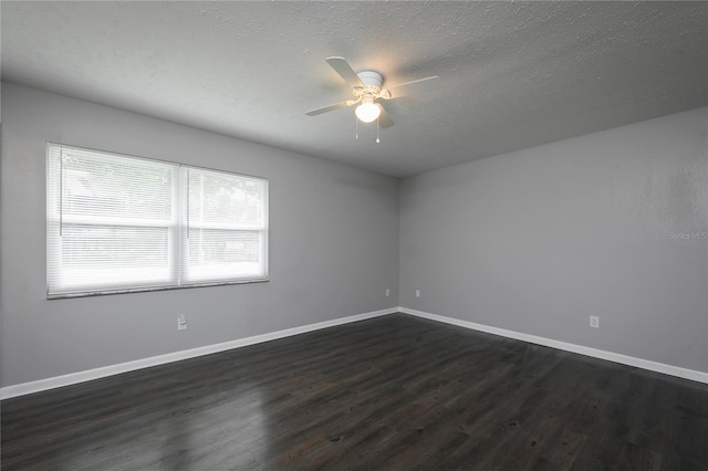 5018 Pine St, Seffner, FL 33584 - unfurnished room featuring dark wood-style floors, a ceiling fan, and a textured ceiling