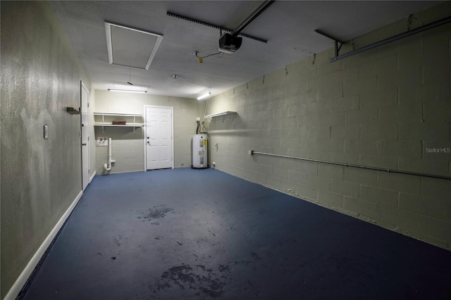 5018 Pine St, Seffner, FL 33584 - garage with a garage door opener, water heater, and concrete block wall