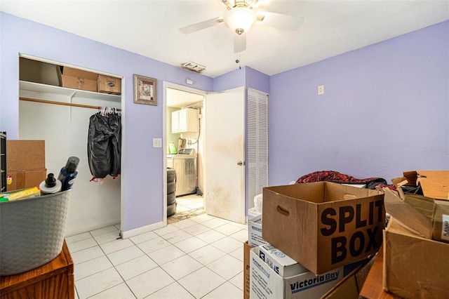 2149 Dixie Garden Loop, Holiday, FL 34690 - bedroom featuring light tile patterned floors and a ceiling fan