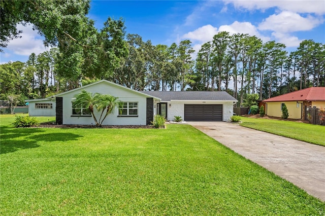 210 Lake Hobbs Rd, Lutz, FL 33548 - view of front facade with a garage and driveway
