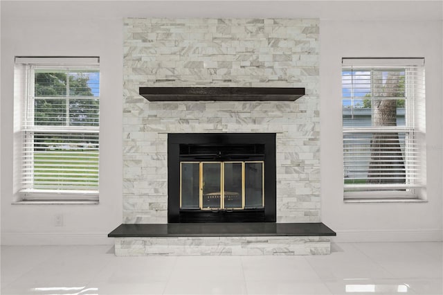210 Lake Hobbs Rd, Lutz, FL 33548 - detailed view of baseboards and a fireplace