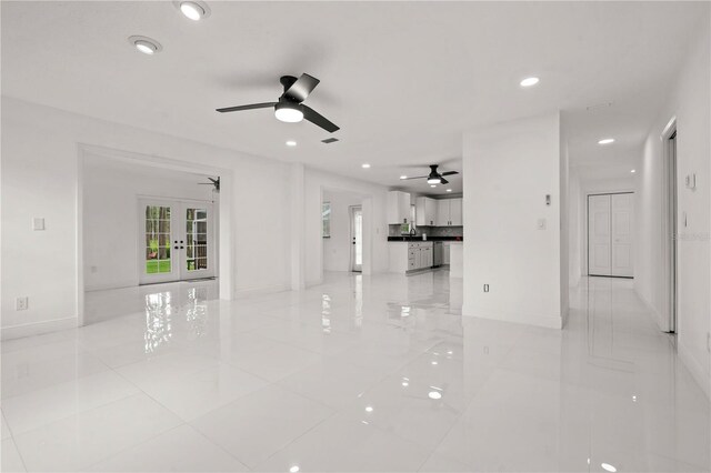 210 Lake Hobbs Rd, Lutz, FL 33548 - unfurnished living room featuring ceiling fan, light tile patterned floors, french doors, and recessed lighting