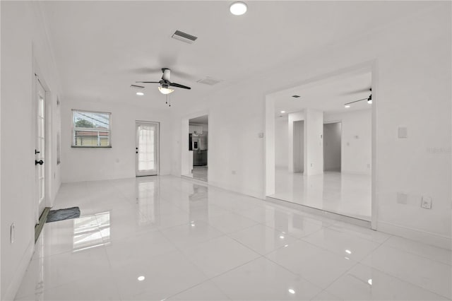 210 Lake Hobbs Rd, Lutz, FL 33548 - unfurnished room featuring light tile patterned floors and ceiling fan