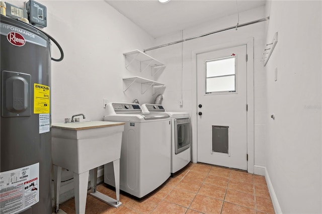 210 Lake Hobbs Rd, Lutz, FL 33548 - washroom with electric water heater, independent washer and dryer, and light tile patterned floors