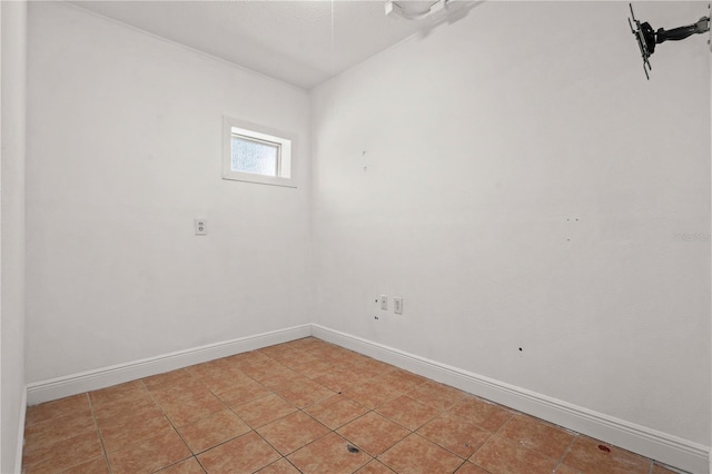 210 Lake Hobbs Rd, Lutz, FL 33548 - spare room featuring baseboards