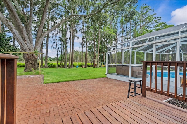 210 Lake Hobbs Rd, Lutz, FL 33548 - wooden terrace with a patio area, a lawn, glass enclosure, and an outdoor pool