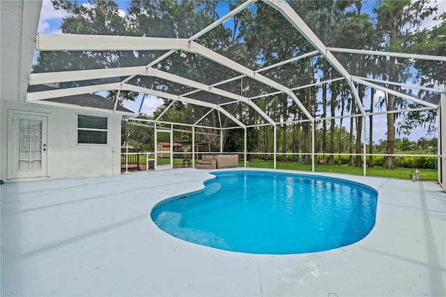 210 Lake Hobbs Rd, Lutz, FL 33548 - outdoor pool with a patio and glass enclosure