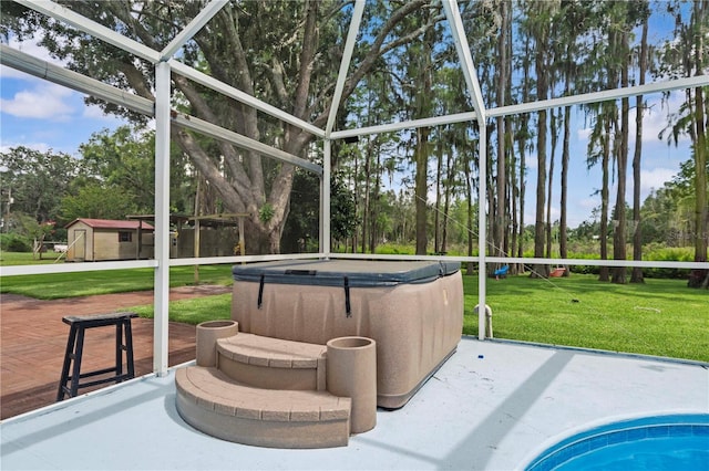 210 Lake Hobbs Rd, Lutz, FL 33548 - view of patio / terrace featuring a hot tub, glass enclosure, and view of wooded area
