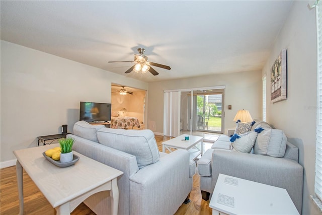2206 Cordova Grn Unit 2206, Seminole, FL 33777 - living area with light wood-style floors and a ceiling fan