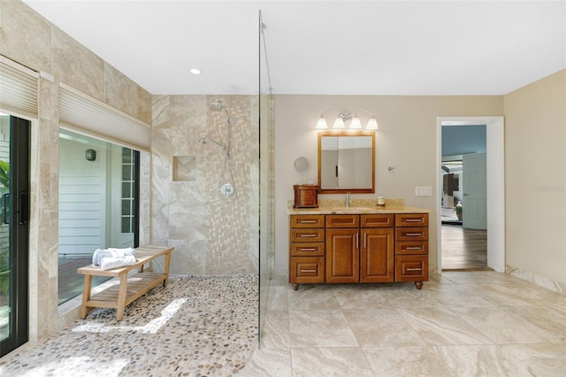 6605 Seabird Way, Apollo Beach, FL 33572 - bathroom with vanity, a walk in shower, and tile patterned floors
