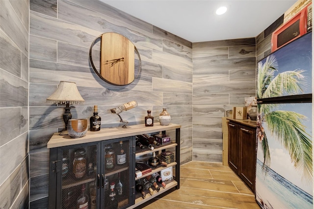 6605 Seabird Way, Apollo Beach, FL 33572 - wine area featuring light wood-type flooring and recessed lighting