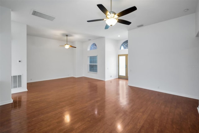 3612 Covington Dr, Holiday, FL 34691 - unfurnished living room featuring a ceiling fan and wood finished floors