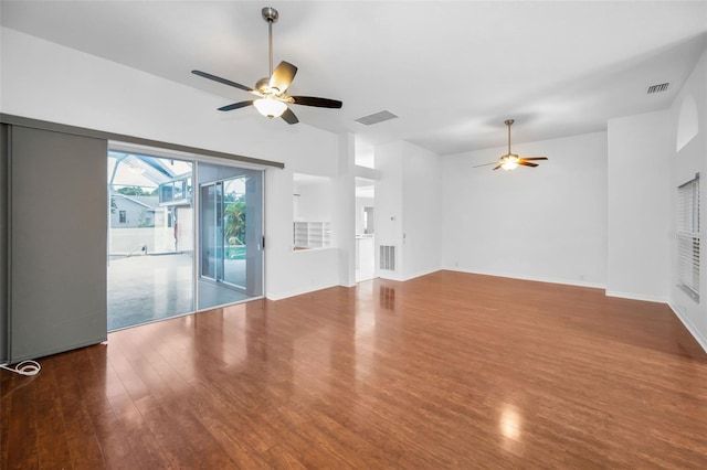 3612 Covington Dr, Holiday, FL 34691 - unfurnished living room with ceiling fan and wood finished floors