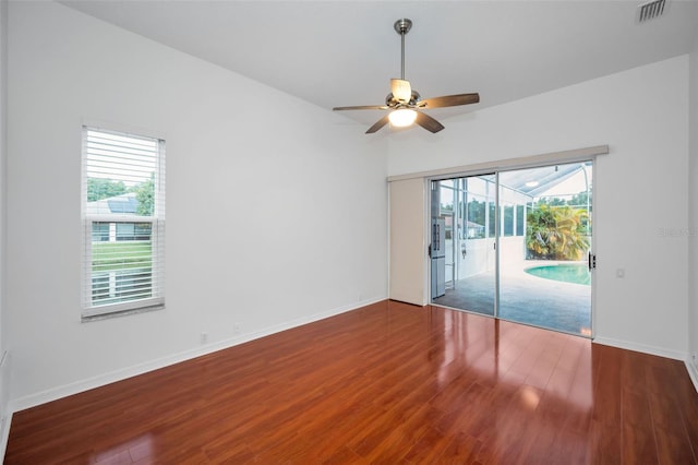3612 Covington Dr, Holiday, FL 34691 - spare room with a ceiling fan and wood finished floors