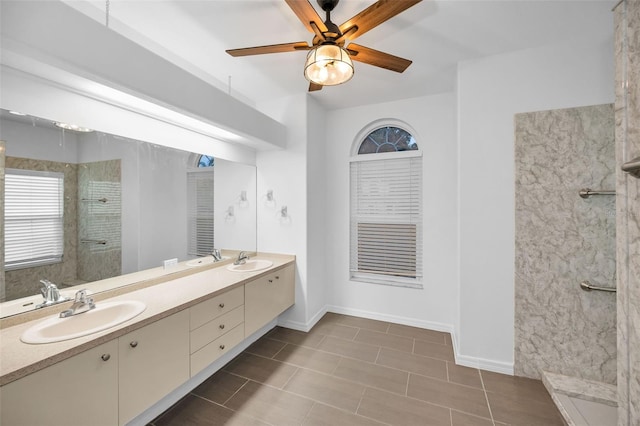 3612 Covington Dr, Holiday, FL 34691 - full bath featuring double vanity, a walk in shower, a ceiling fan, and tile patterned flooring