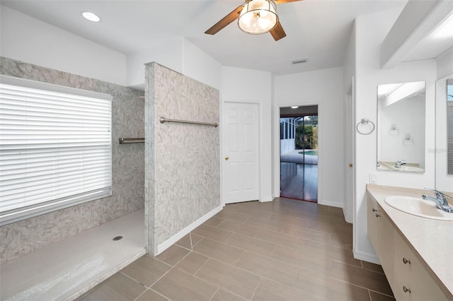 3612 Covington Dr, Holiday, FL 34691 - bathroom with a ceiling fan, walk in shower, and vanity