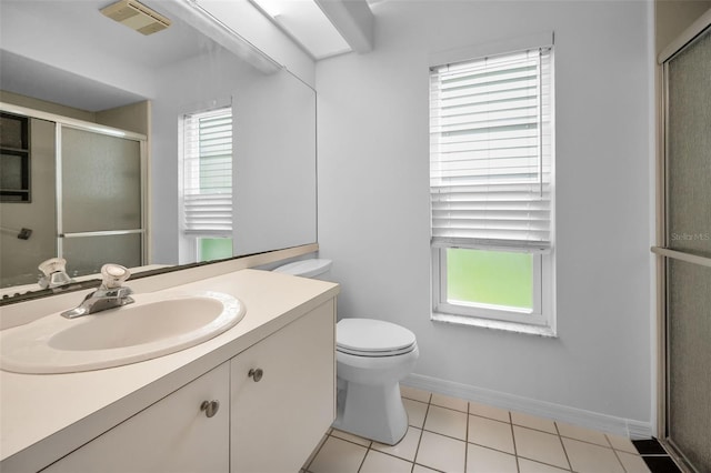 3612 Covington Dr, Holiday, FL 34691 - full bath with healthy amount of natural light, tile patterned floors, vanity, and an enclosed shower