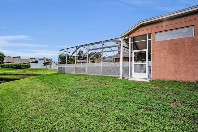 3612 Covington Dr, Holiday, FL 34691 - view of grassy yard with a lanai