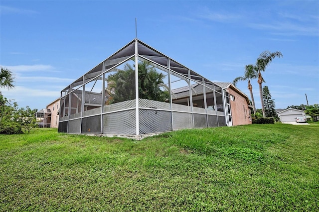 3612 Covington Dr, Holiday, FL 34691 - rear view of property featuring a lanai and a yard