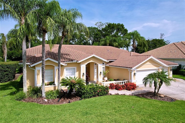 1358 Forestedge Blvd, Oldsmar, FL 34677 - view of front of home with a tile roof, a front yard, stucco siding, and a garage